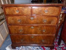 AN 18th.C.AND LATER WALNUT AND CROSSBANDED CHEST OF TWO SHORT AND THREE LONG GRADUATED DRAWERS. W.93