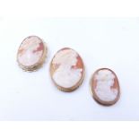 A GROUP OF THREE CAMEO BROOCHES, ALL BEARING A PORTRAIT OF A MAIDEN, ALL MOUNTED IN 9ct YELLOW GOLD.
