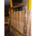 AN IMPRESSIVE GILT FRENCH STYLE FRAME. OVER ALL. 190 x 168cms. REBATE 160 x 124cms.