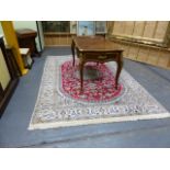 A PERSIAN CARPET OF CLASSIC DESIGN. 284 x 197cms.