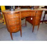 AN ANTIQUE SATINWOOD SHERATON STYLE PAINT DECORATED KIDNEY SHAPED WRITING DESK WITH LEATHER INSET