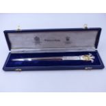 A SILVER ROYAL WEDDING COMMEMORATIVE CASED MAPPIN AND WEBB SPECIMEN HALLMARK LETTER OPENER TOPPED