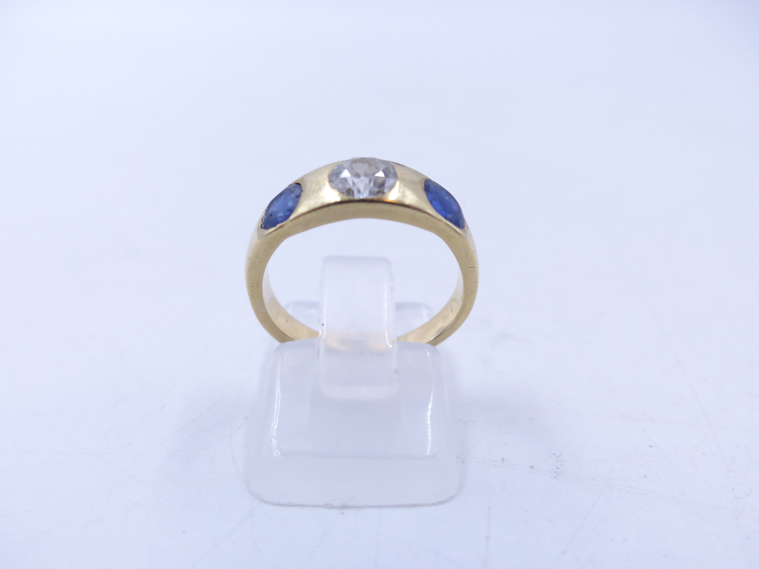 AN 18 STAMPED YELLOW GOLD SAPPHIRE AND DIAMOND THREE STONE TRADITIONAL GYPSY-SET RING. THE CENTRE - Image 6 of 9