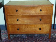 A RARE HEAL'S GOLDEN OAK CHEST OF THREE DRAWERS. W.91cms.