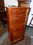 A VICTORIAN WALNUT SIDE LOCKING WELLINGTON CHEST OF SEVEN GRADUATED DRAWERS. W.49 x H.102cms.