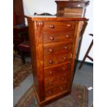 A VICTORIAN WALNUT SIDE LOCKING WELLINGTON CHEST OF SEVEN GRADUATED DRAWERS. W.49 x H.102cms.