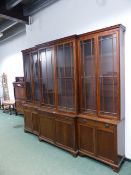 A LARGE 19th.C.MAHOGANY BREAKFRONT LIBRARY BOOKCASE. W.280 x H.243cms.