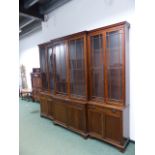 A LARGE 19th.C.MAHOGANY BREAKFRONT LIBRARY BOOKCASE. W.280 x H.243cms.