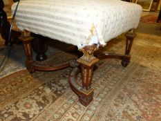 A 19th.C.WALNUT AND GILT DECORATED STOOL WITH X STRETCHER. 59 x 53cms.