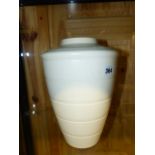 A WEDGWOOD CREAM TAPERED CYLINDRICAL VASE BY KEITH MURRAY. H.29cms.