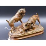 AN EARLY 20th.C.BRONZE FIGURE GROUP OF HUNTING DOGS OVER A RABBIT SIGNED ARSON. W.22cms.