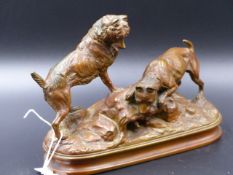 AN EARLY 20th.C.BRONZE FIGURE GROUP OF HUNTING DOGS OVER A RABBIT SIGNED ARSON. W.22cms.