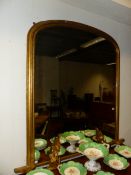 A LARGE VICTORIAN GILT FRAMED OVERMANTLE MIRROR. W.111 x H.135cms.