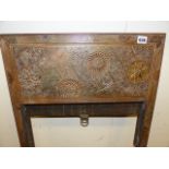 AN ARTS AND CRAFTS BRASS FIRE SURROUND IN THE MANNER OF THOMAS JEKYLL