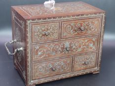 A 19th.C.CONTINENTAL MAHOGANY AND ENGRAVED METAL INLAID TRAVELLING DESK BOX OF FIVE SMALL DRAWERS