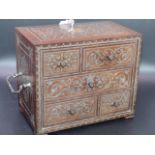 A 19th.C.CONTINENTAL MAHOGANY AND ENGRAVED METAL INLAID TRAVELLING DESK BOX OF FIVE SMALL DRAWERS