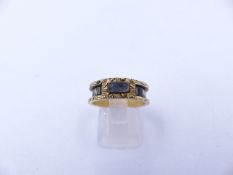 AN 18ct GOLD AND BLACK ENAMEL VICTORIAN MOURNING RING, THE BAND IS INSCRIBED WITH THE WORDS IN