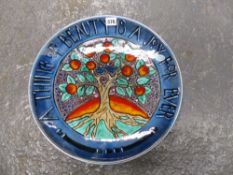 A POOLE POTTERY LIMITED EDITION TREE OF LIFE PLATE, NO 254/1500. DIA. 40cms.