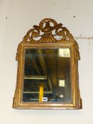 AN EARLY 19th.C.CARVED GILTWOOD SMALL MIRROR.