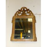 AN EARLY 19th.C.CARVED GILTWOOD SMALL MIRROR.