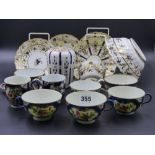 FOUR WORCESTER PORCELAIN TEA CUPS, TWO COFFEE CUPS, A LIDDED TEAPOY, SPOON, TRAY, ETC