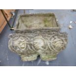 A PAIR OF GARDEN PLANTERS WITH CLASSICAL FIGURE AND VINE DECORATION, EACH 56 x 32cms.
