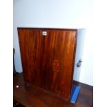 A LATE GEORGIAN MAHOGANY AND BOXWOOD INLAID TWO DOOR TABLE CABINET WITH SIDE CARRYING HANDLES. W.