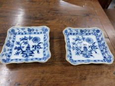 A PAIR OF MEISSEN ONION PATTERN SQUARE FORM SERVING DISHES WITH CROSSED SWORD MARK, Dia.23.5cms.