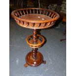 A VICTORIAN ROSEWOOD TWO TIER WINE TABLE.