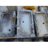 THREE ANTIQUE SHALLOW CARVED STONE SINKS. LARGEST, 78 x 46cms.
