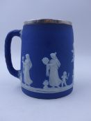 A BLUE JASPER WEDGEWOOD AND ELKINGTON & CO LTD, SILVER RIMMED TANKARD, PRESENTED AS A RIFLE PRIZE TO
