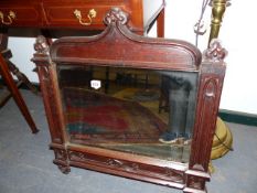 A 19th.C.OAK GOTHIC REVIVAL CARVED FRAMED WALL MIRROR. W.65 x H.70cms.