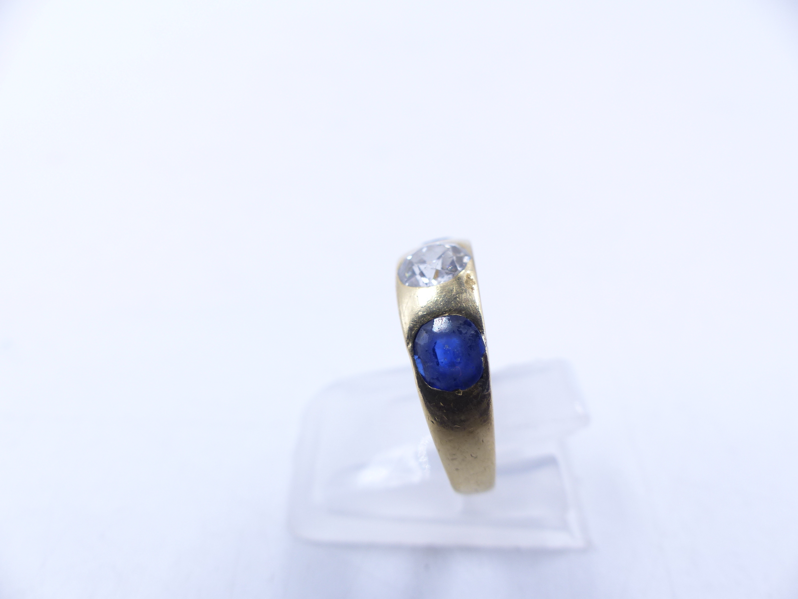AN 18 STAMPED YELLOW GOLD SAPPHIRE AND DIAMOND THREE STONE TRADITIONAL GYPSY-SET RING. THE CENTRE - Image 3 of 9