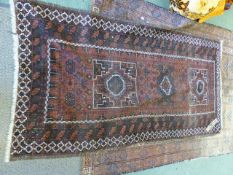 AN ANTIQUE AFGHAN ENGSI RUG. 214 x 136cms. TOGETHER WITH A SMALLER ANTIQUE BELOUCH RUG.