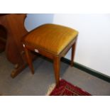 A PAIR OF CONTINENTAL WALNUT STOOLS ON SQUARE TAPER LEGS.