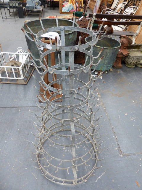 A VINTAGE GALVANISED BOTTLE DRYING RACK.