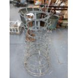 A VINTAGE GALVANISED BOTTLE DRYING RACK.