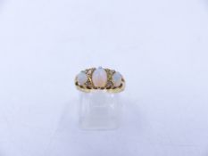 AN 18ct OPAL AND DIAMOND GRADUATED THREE STONE CLAW SET RING, DATED 1905, BIRMINGHAM. FINGER SIZE N,