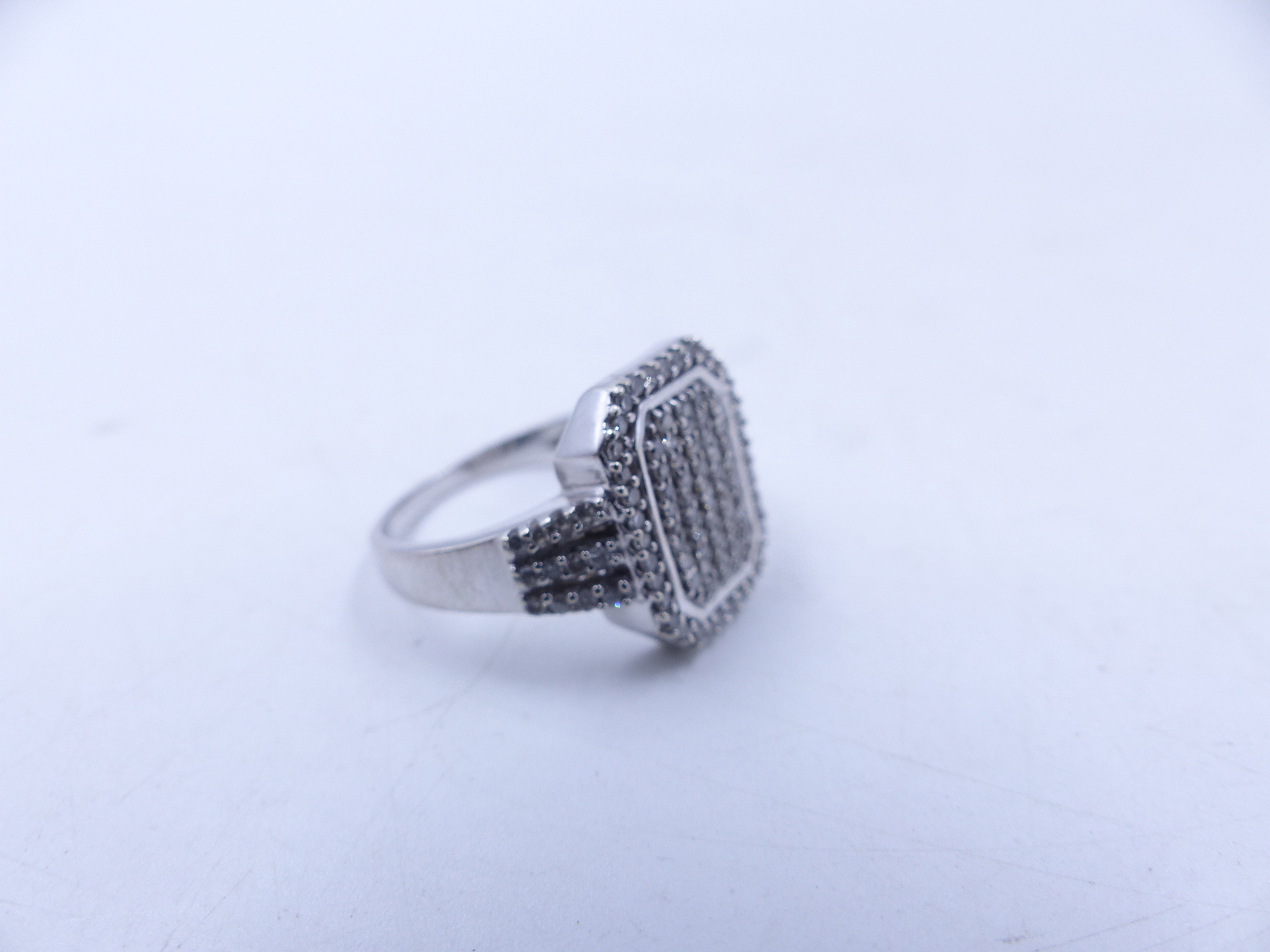 A 9ct WHITE GOLD DIAMOND PAVE SET RING. THE OCTAGONAL HEAD MEASURES 1.5cm X 1.1cm, WEIGHT 4.5grms, - Image 12 of 13