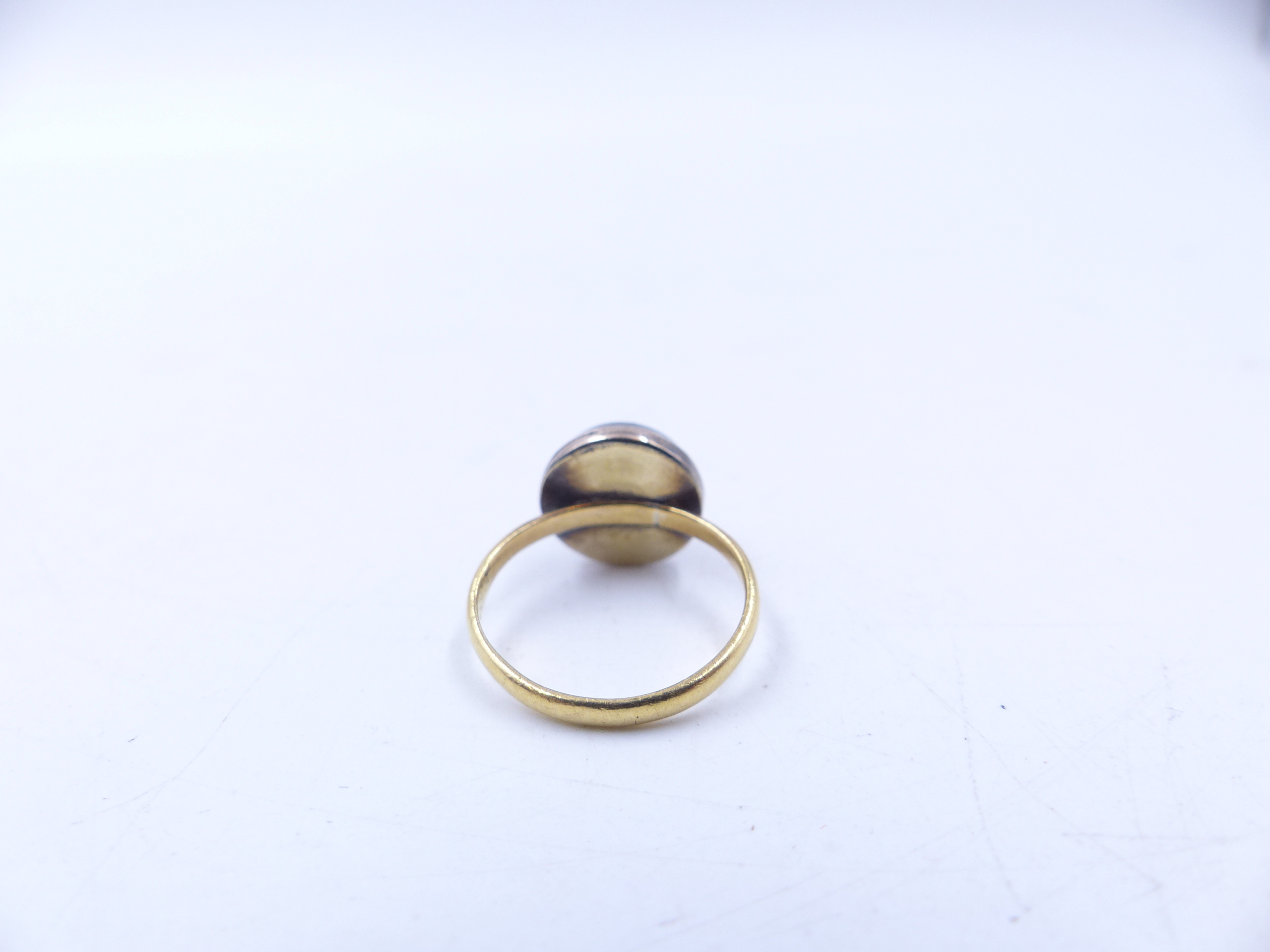 AN ANTIQUE 22ct YELLOW GOLD CABOCHON GARNET AND OLD CUT DIAMOND STAR BURST RING. FINGER SIZE J. - Image 6 of 9