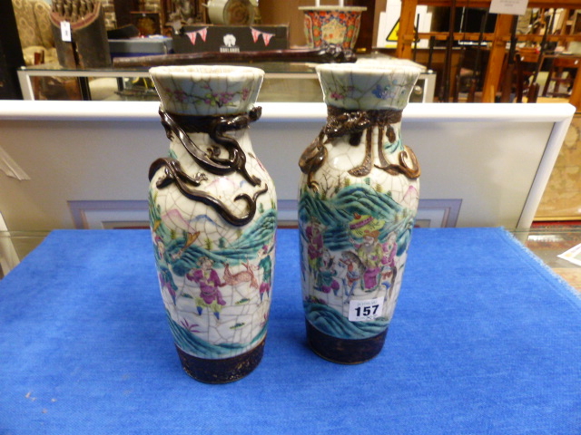 A PAIR OF CHINESE FAMILLE ROSE WARRIOR DECORATED CRACKLE GLAZE VASES WITH APPLIED DRAGON COLLARS AND - Image 15 of 48