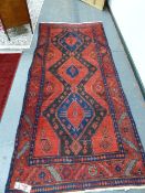 A PERSIAN HAMADAN RUG, 278 x 121cms AND ANOTHER SMALLER EXAMPLE. (2)