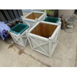 TWO PAIRS OF PAINTED PINE GARDEN PLANTERS.