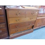 AN EDWARDIAN INLAID CHEST OF DRAWERS.