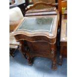 A VICTORIAN WALNUT DAVENPORT DESK.