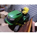 A JOHN DEERE TRACTOR MOWER.