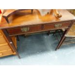 AN EDWARDIAN MAHOGANY TWO DRAWER SIDE TABLE BY SHULBRED.