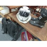 A SET OF MOTORCYCLE LEATHER JACKET AND TROUSERS, BOOTS AND A NEAR NEW CRASH HELMET.