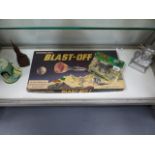 A VINTAGE WADDINGTONS BOARD GAME, BLAST OFF!TOGETHER WITH NOVELTY MONEY BOXES, ETC.