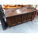 AN OAK BLANKET CHEST.